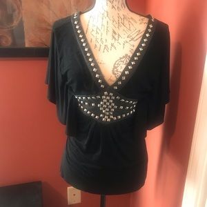 Sexy black top with grommet details